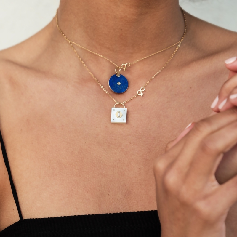 18 carat yellow gold pendant medal recycled natural stones Pi lapis lazuli medal gold padlock medal white mother-of-pearl gold mineral jewelery