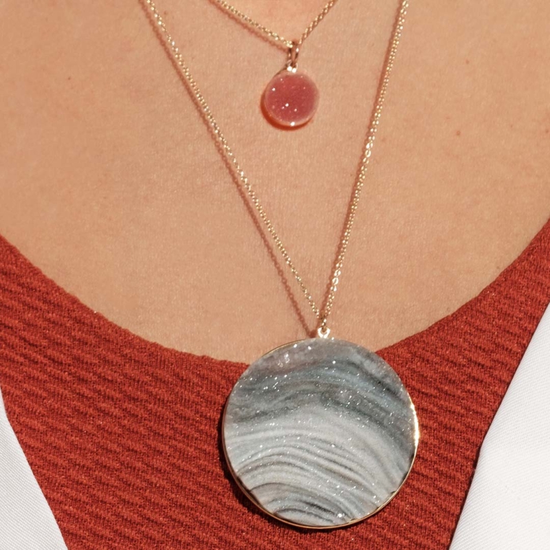 red natural stone druzy medallion and gray stone conchina necklace