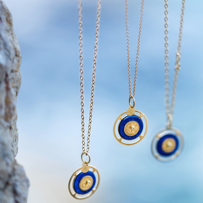 18 carat gold zodiac medals recycled lapis lazuli